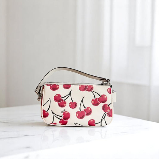 🍒 COACH Nolita 19 Cherry Print Canvas Smooth Leather Wristlet – Small Handbag – White